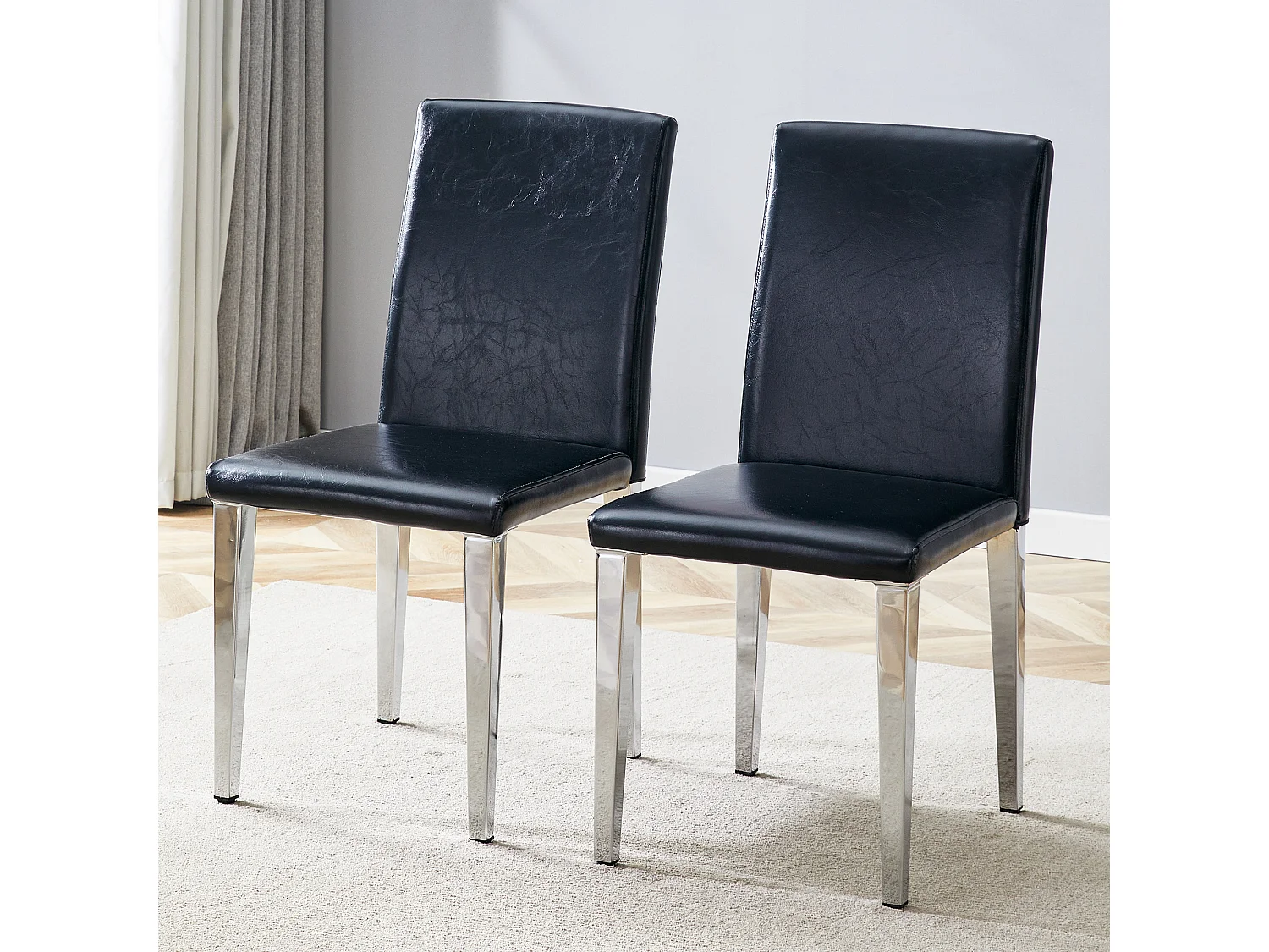 Lot de 2 chaises de salle à manger en similicuir noir avec pieds en métal argenté