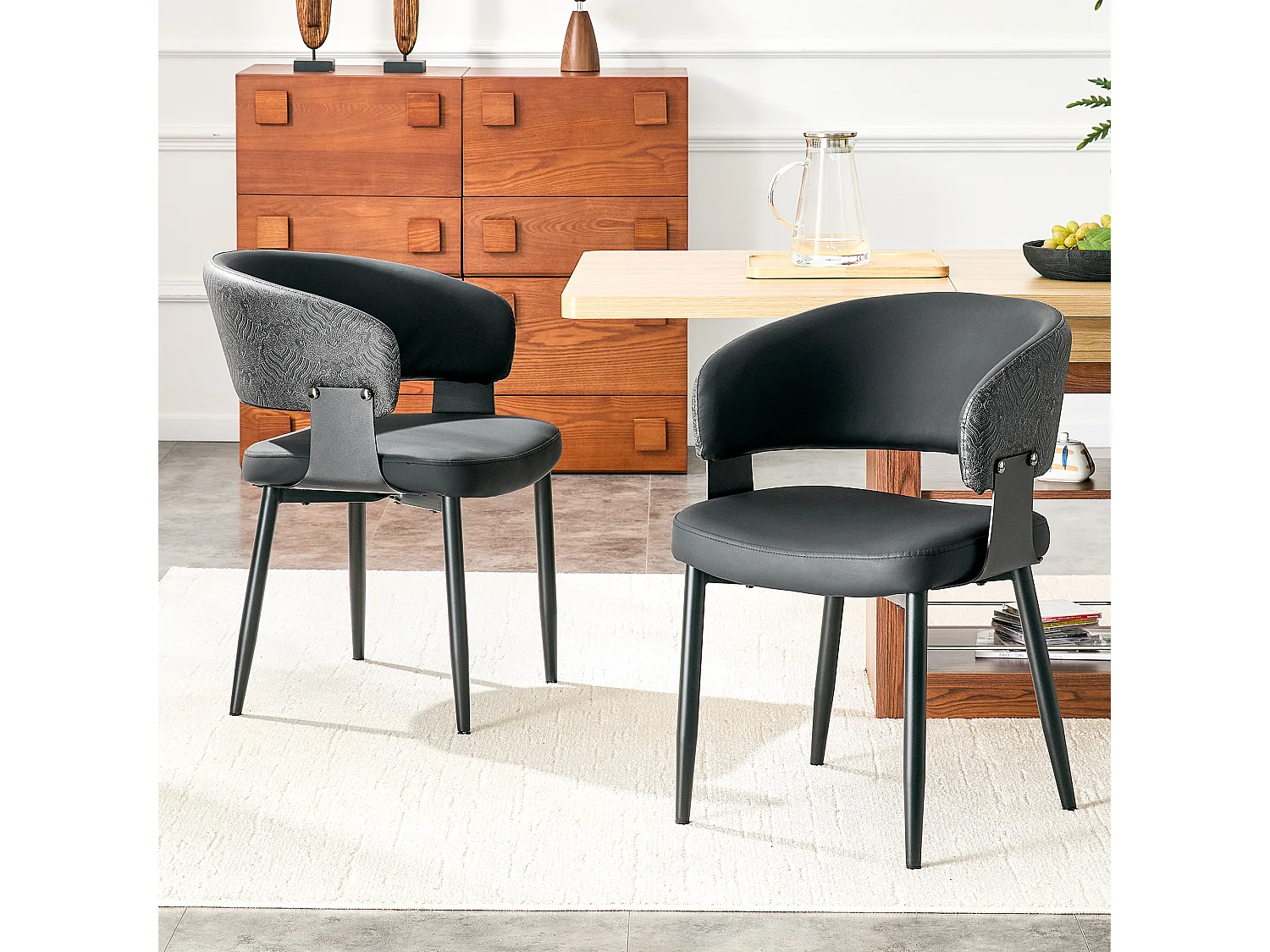 Juego de 2 sillas de comedor con reposabrazos de polipiel negra y patas de metal negro
