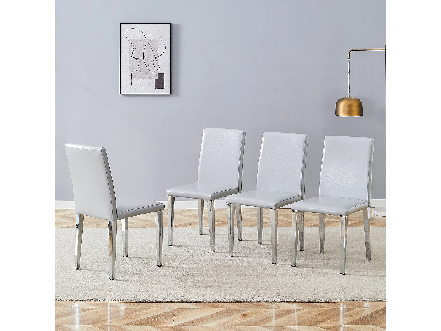 Lot de 4 chaises de salle à manger en similicuir gris clair avec pieds en métal argenté
