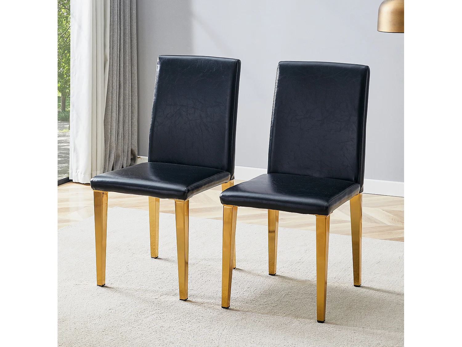Lot de 2 chaises de salle à manger en similicuir noir avec pieds en métal doré