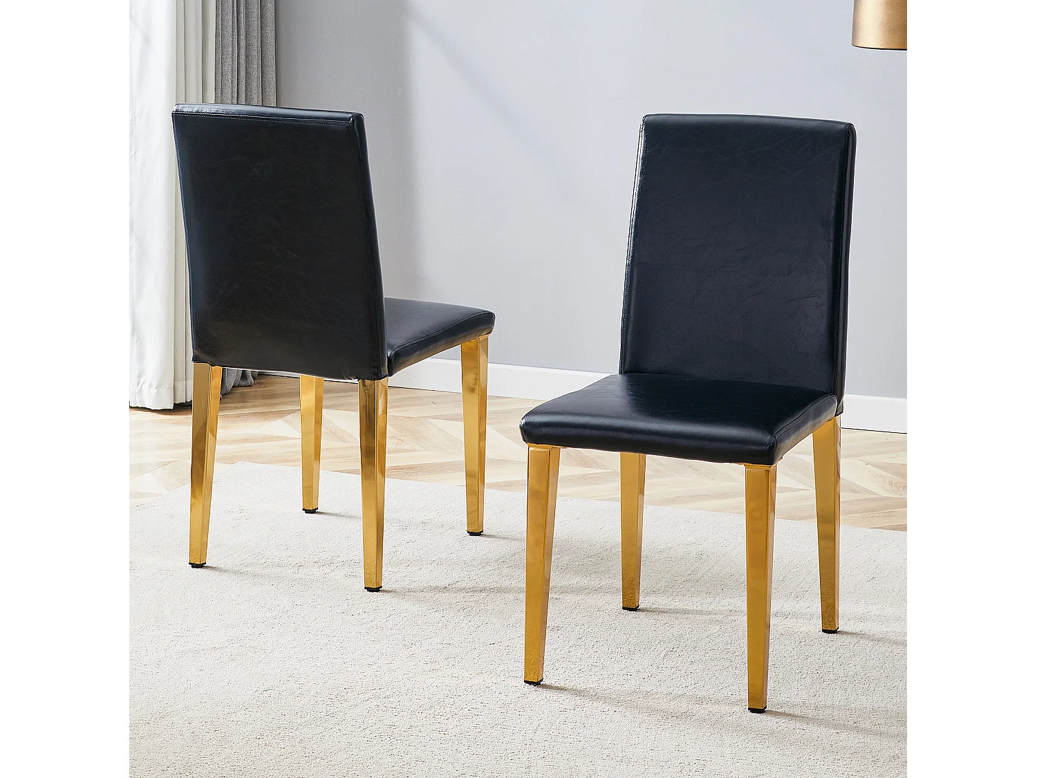 Lot de 2 chaises de salle à manger en similicuir noir avec pieds en métal doré