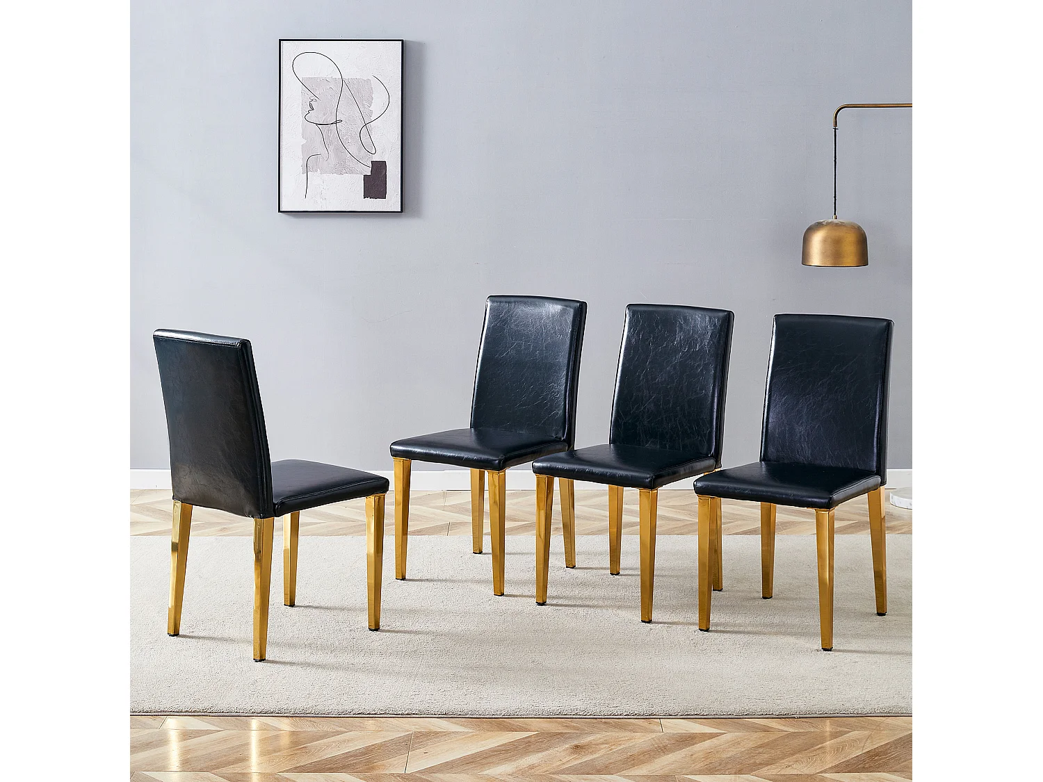 Lot de 4 chaises de salle à manger en similicuir noir avec pieds en métal doré