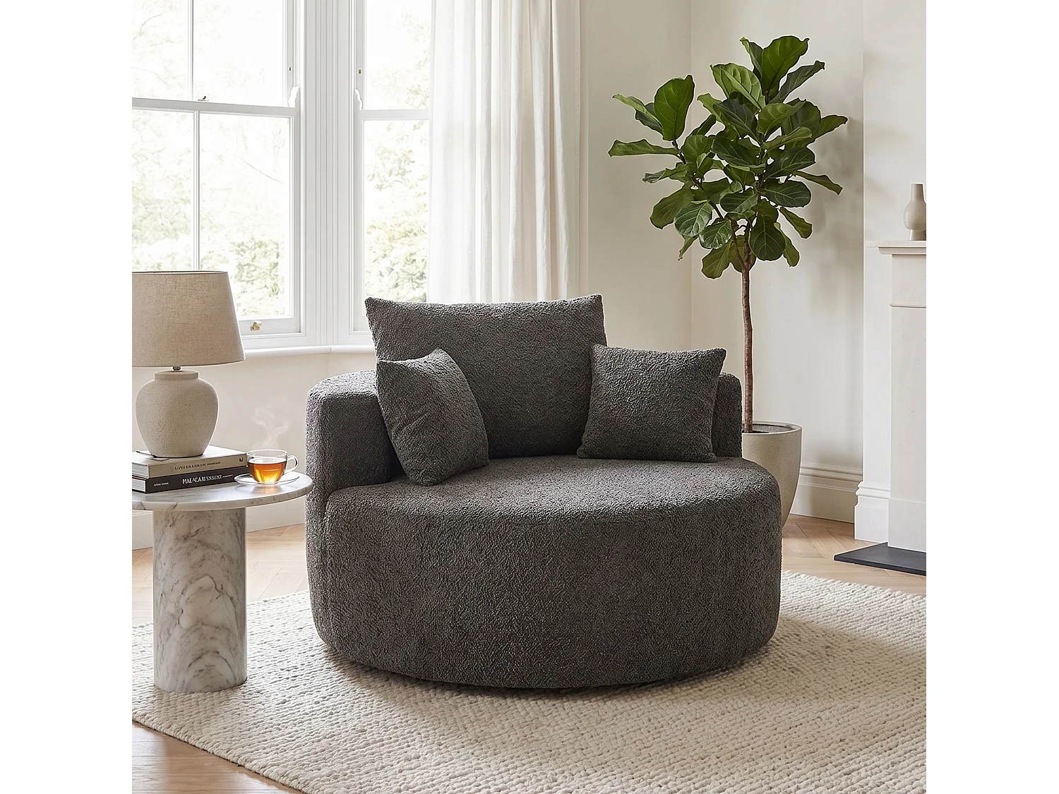 Fauteuil simple rond en chenille gris avec coussins sans montage