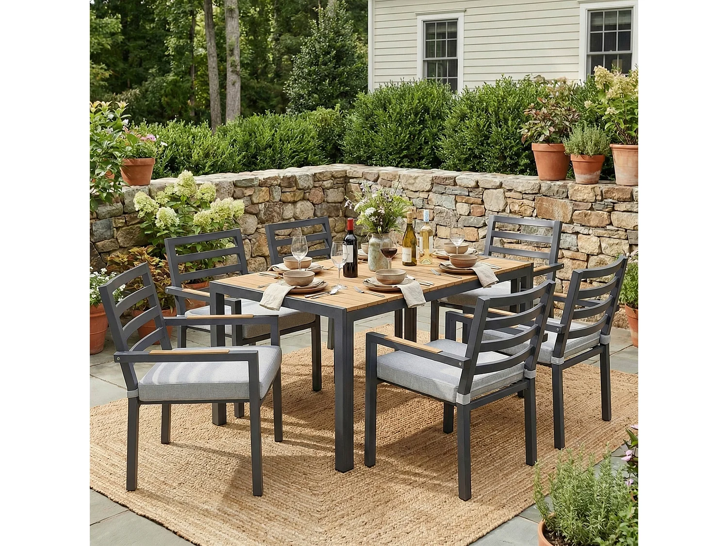 Set da pranzo da giardino con 6 sedie e 1 tavolo (L. 143,5 cm) - Poliestere e acciaio - Grigio