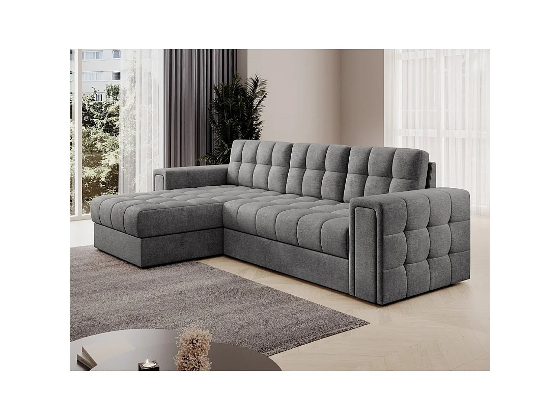 Sofá de esquina convertible KAPITARA gris capitoné reversible con baúl de almacenamiento