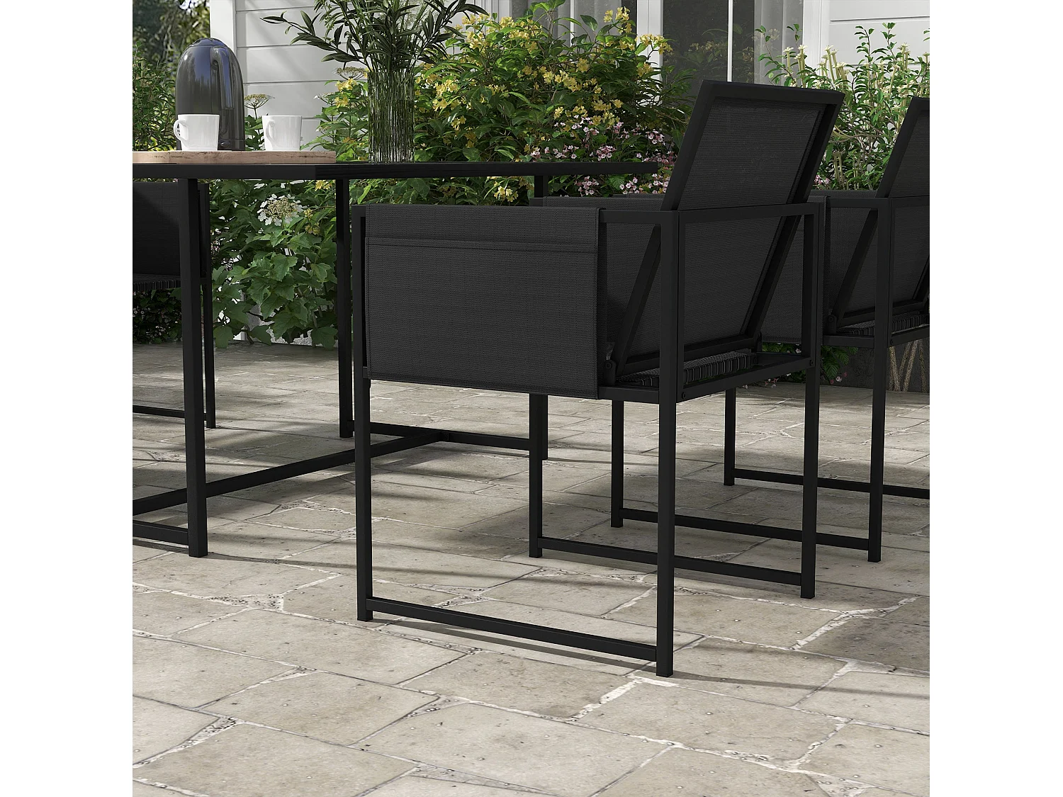 Bamico 4 Seater Black Metal Garden Dining Set with Mesh Seats and Glass Table