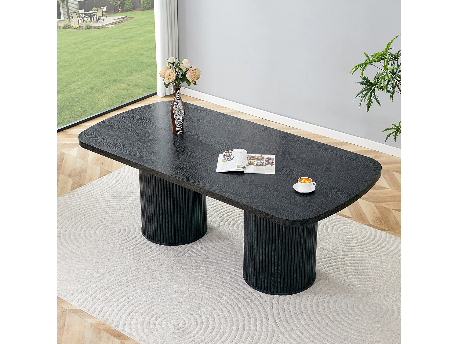 Table à manger ovale 180 x 90 cm noire pour 6 à 8 places - Pied central cannelé