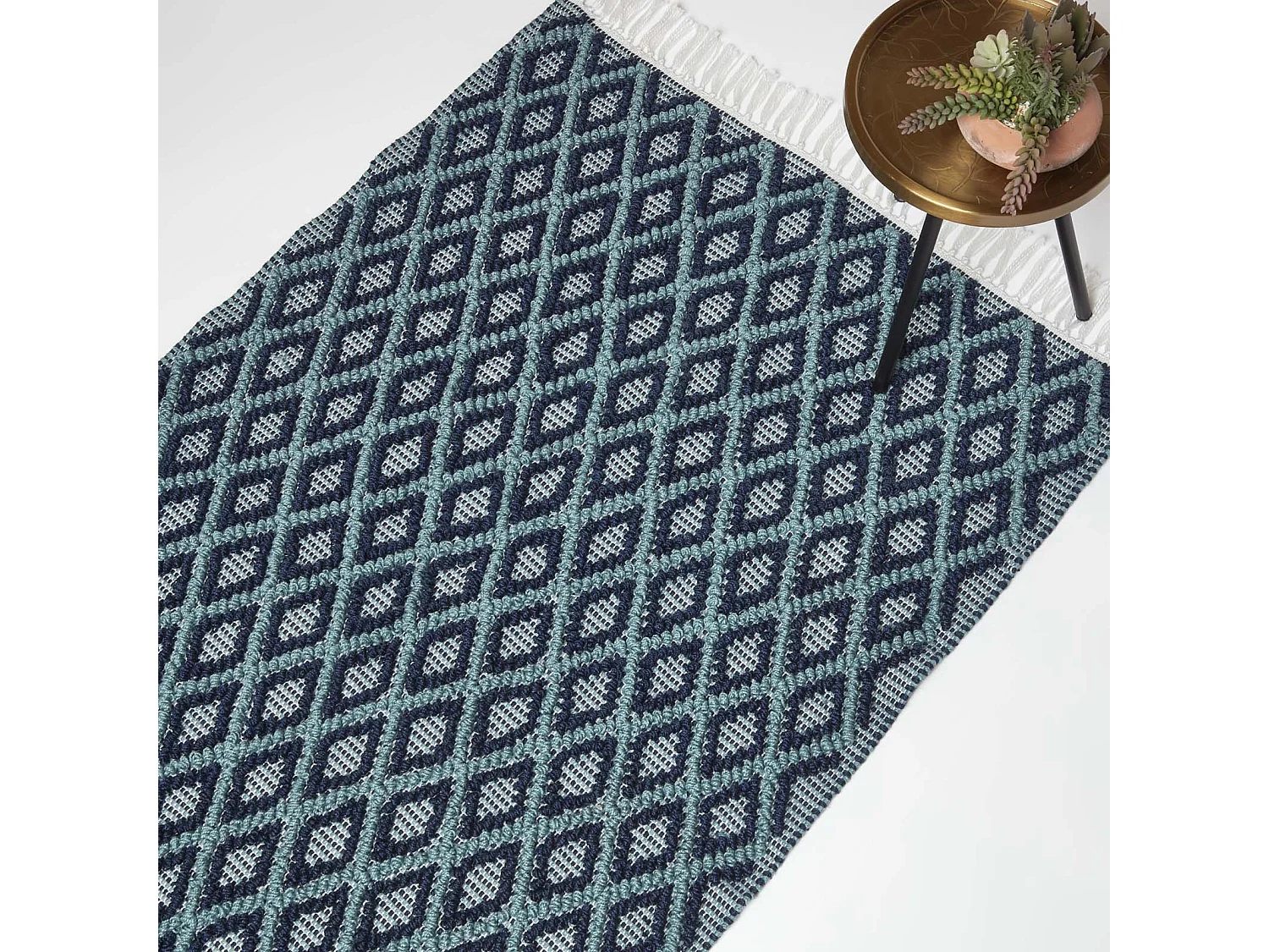 Homescapes Tula Handwoven Teal & Navy Textured Rug, 90 x 150 cm