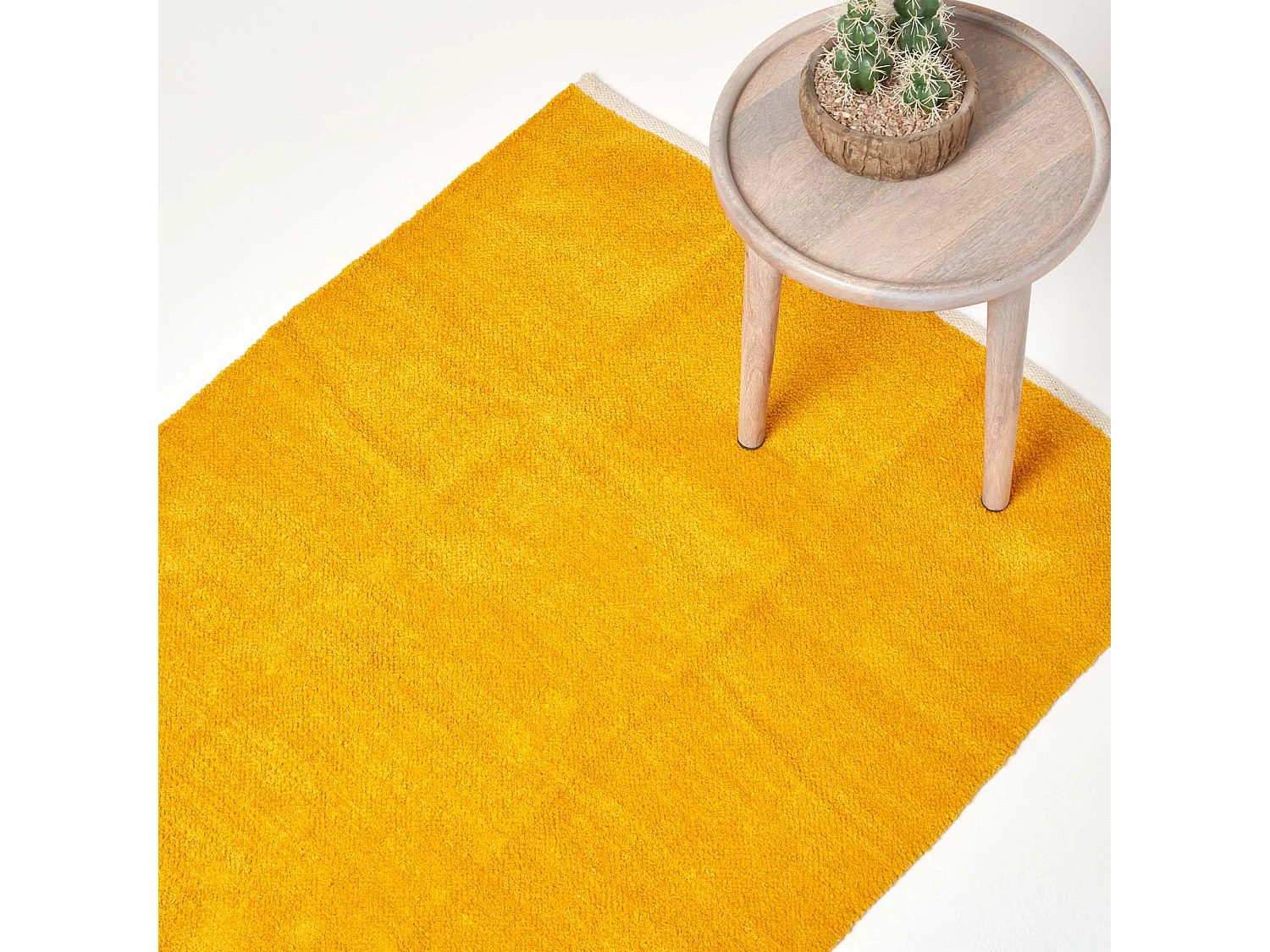Homescapes Mustard 100% Cotton Plain Chenille Rug with Natural Trim, 45 x 70 cm