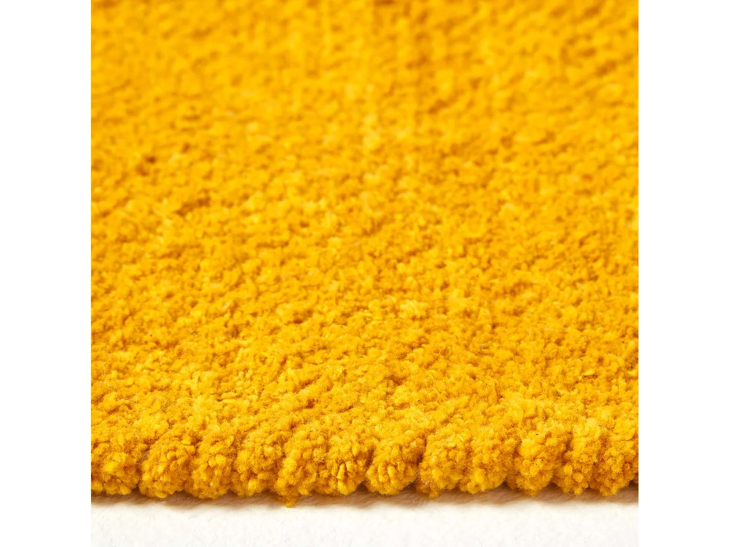 Homescapes Mustard 100% Cotton Plain Chenille Rug with Natural Trim, 45 x 70 cm