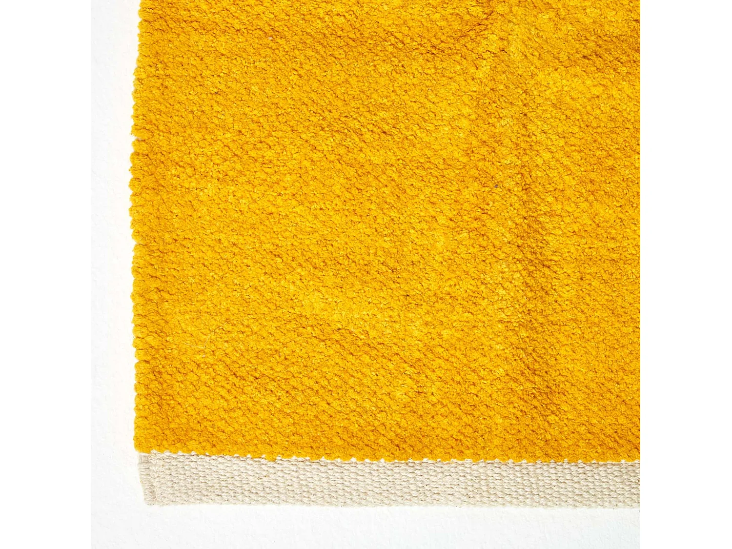 Homescapes Mustard 100% Cotton Plain Chenille Rug with Natural Trim, 66 x 200 cm