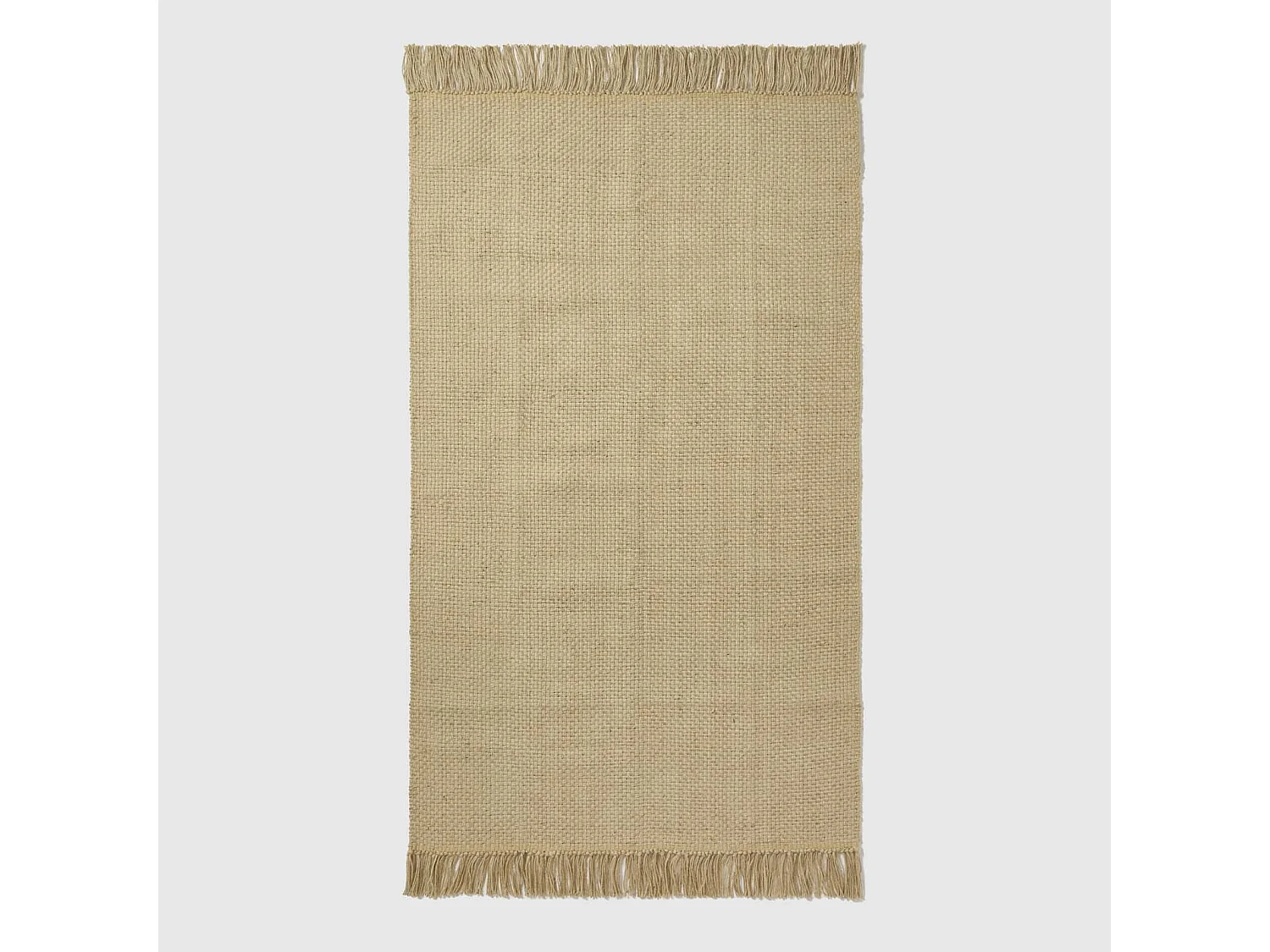 Homescapes Zaphyr Natural Handwoven Jute Rug with Tassels, 90 x 150 cm