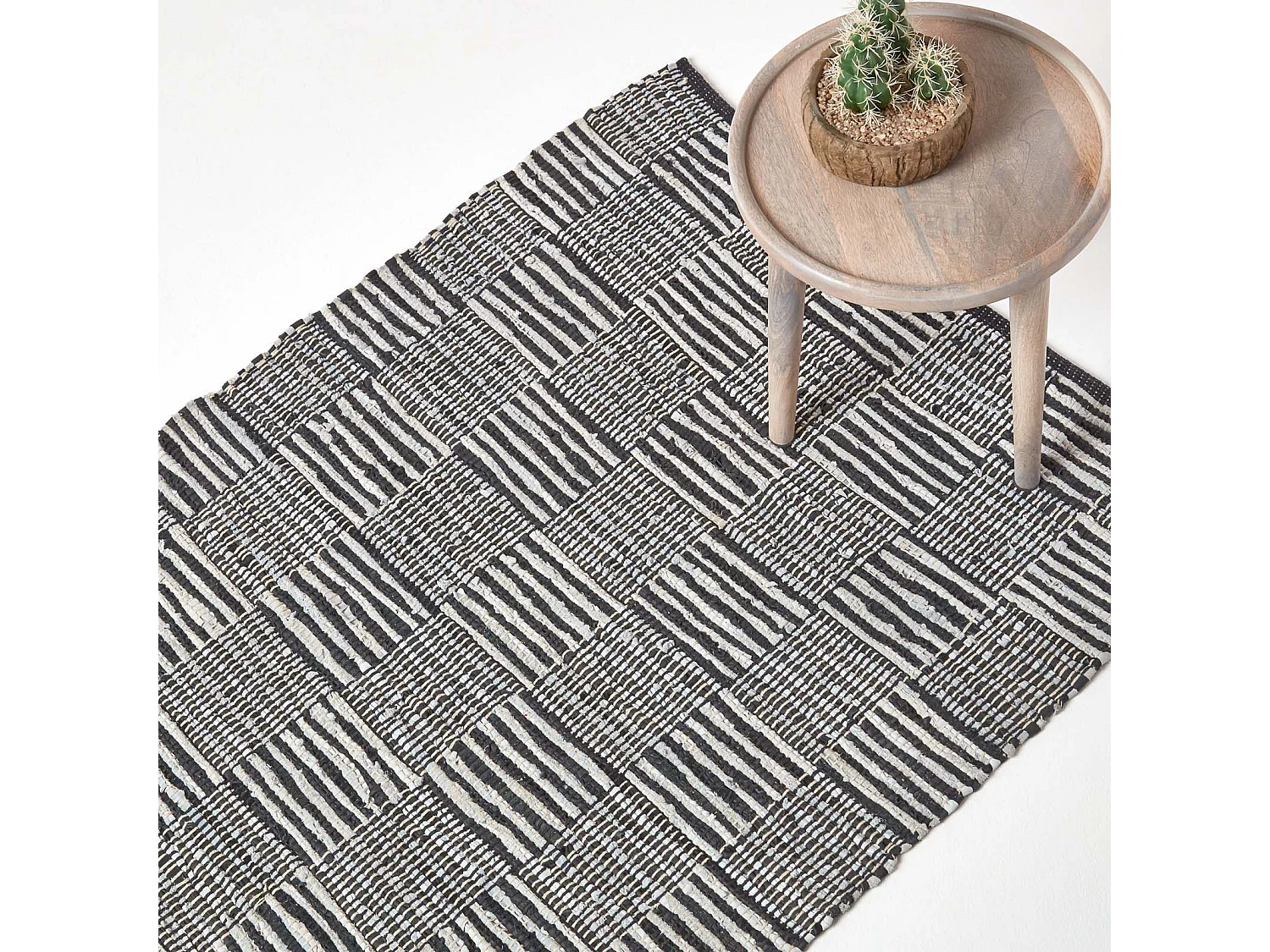 Homescapes Black & White Real Leather Handwoven Striped Block Check Rug, 150 x 240 cm