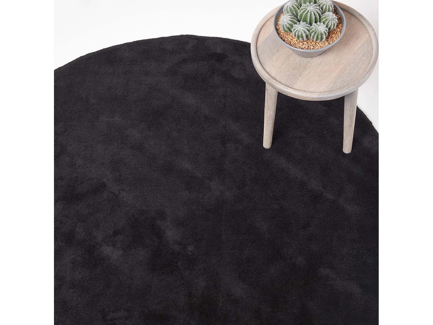 Homescapes Hand Tufted Plain Cotton Black Large Round Rug, 150 cm Diameter