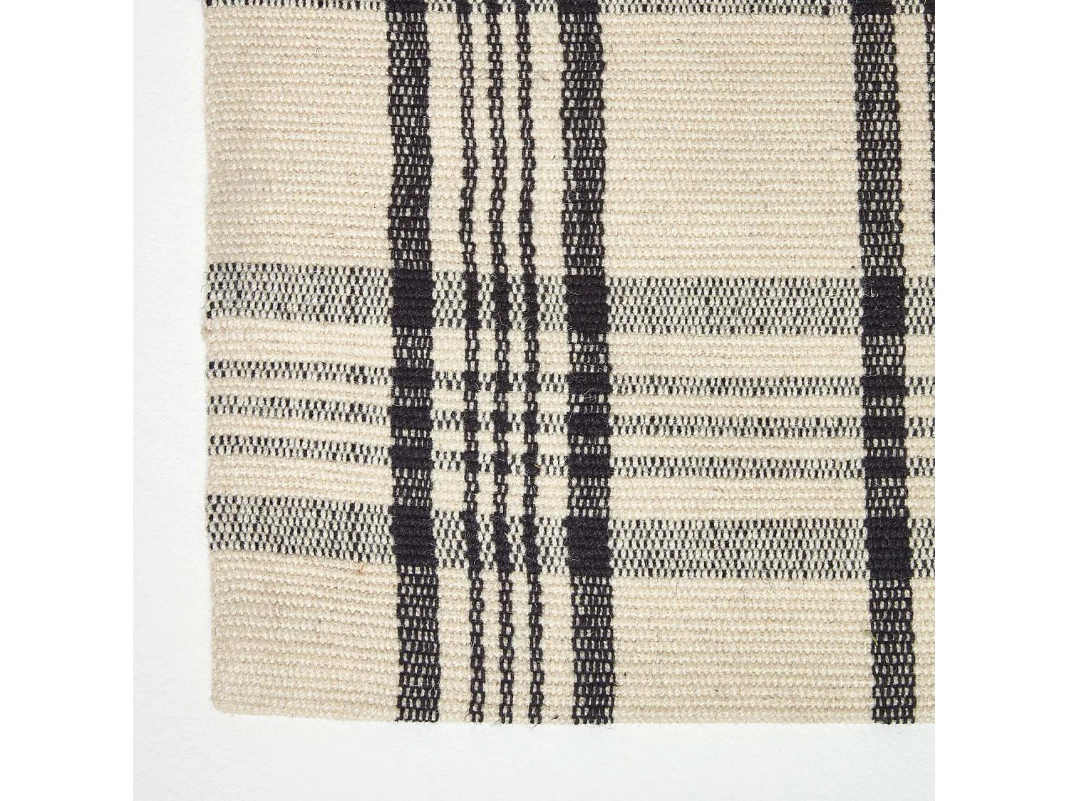 Homescapes Logan Black and White Tartan Check Non-Slip 100% Wool Rug, 150 x 240 cm