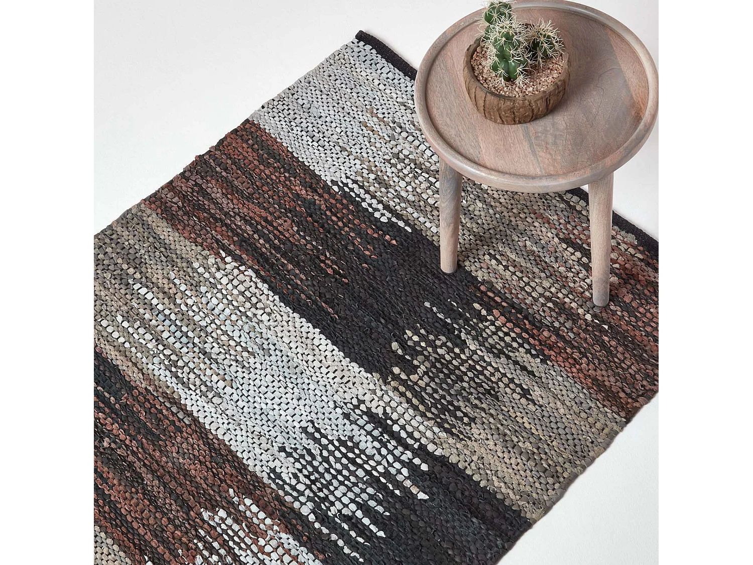 Homescapes Black, Grey & Brown Real Leather Handwoven Cutshuttle Rug, 90 x 150 cm