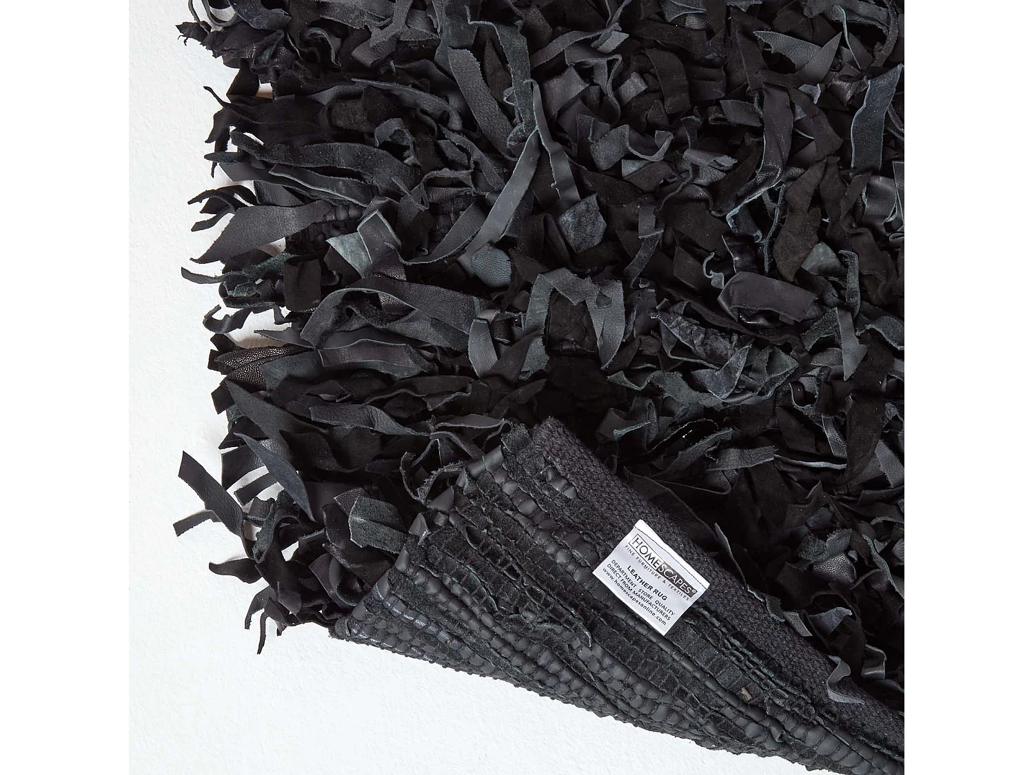 Homescapes Dallas Leather Shaggy Rug Black, 90 x 150 cm