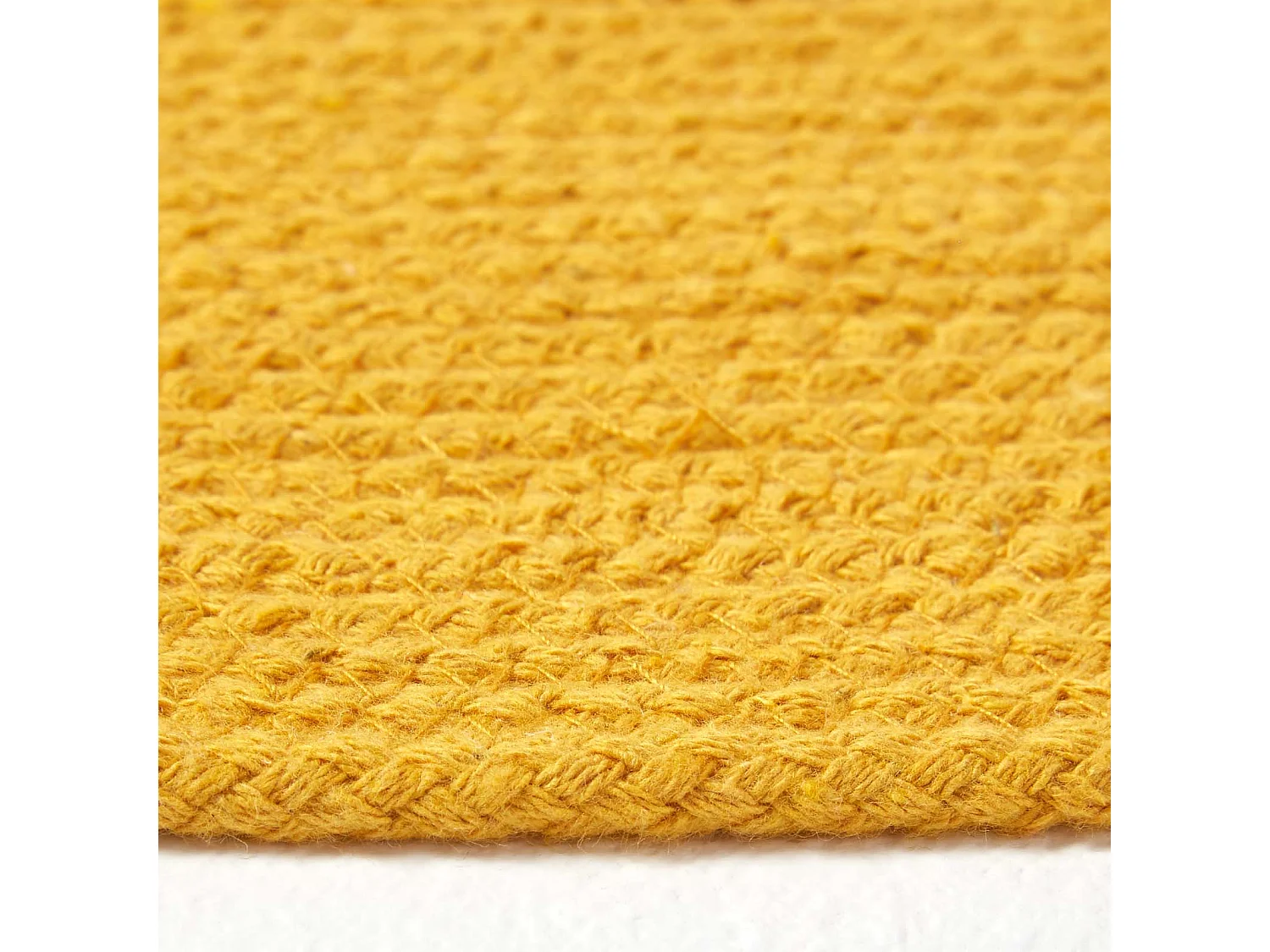 Homescapes Mustard Yellow Handmade Woven Braided Oval Rug, 60 x 90 cm