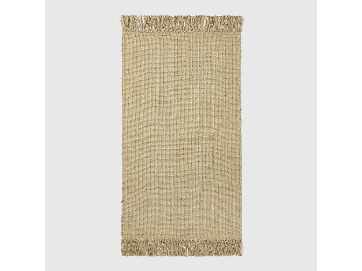 Homescapes Zaphyr Natural Handwoven Jute Rug with Tassels, 70 x 120 cm