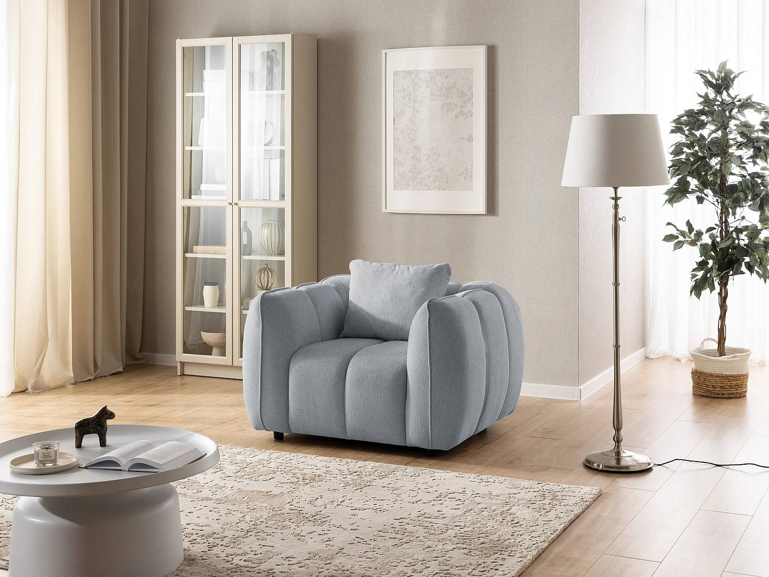 Fauteuil confortable au design moderne, avec un revêtement en tissu texturé doux et un capitonnage profond en style bubble - NUBIRA