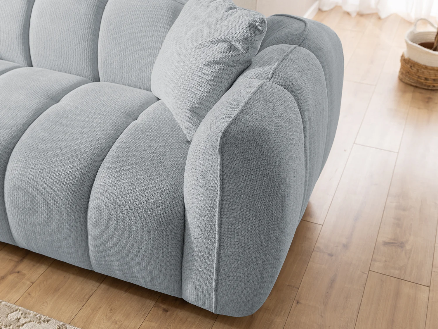 Fauteuil confortable au design moderne, avec un revêtement en tissu texturé doux et un capitonnage profond en style bubble - NUBIRA