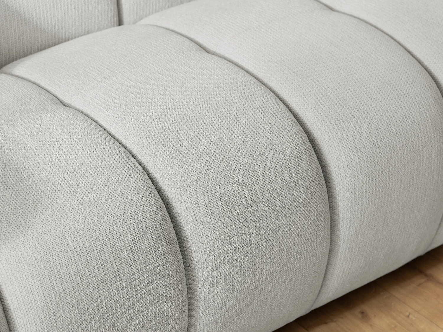 Fauteuil confortable au design moderne, avec un revêtement en tissu texturé doux et un capitonnage profond en style bubble - NUBIRA