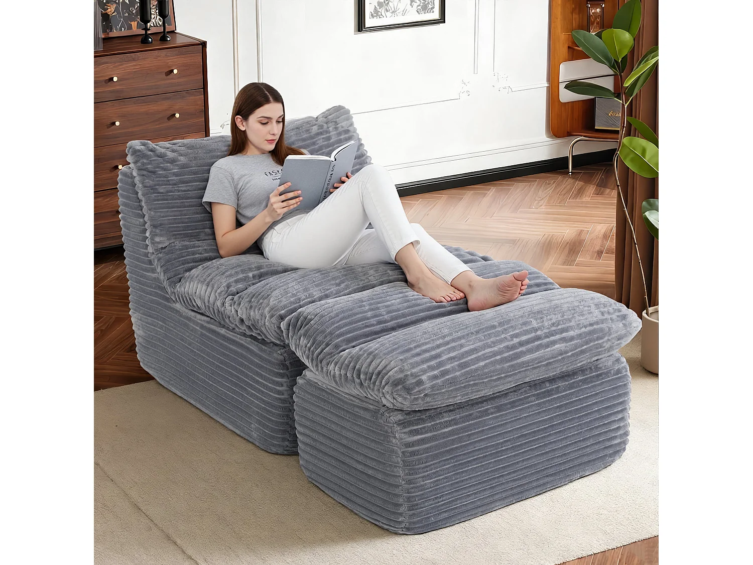 Grijze relaxfauteuil, frameloos en zonder montage, ergonomisch met voetensteun, traagschuim met hoge dichtheid