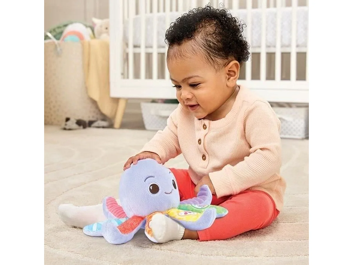Brinquedo de Pelúcia Musical Interativo Polvo Lila VTech para Bebês de 3 a 36 Meses
