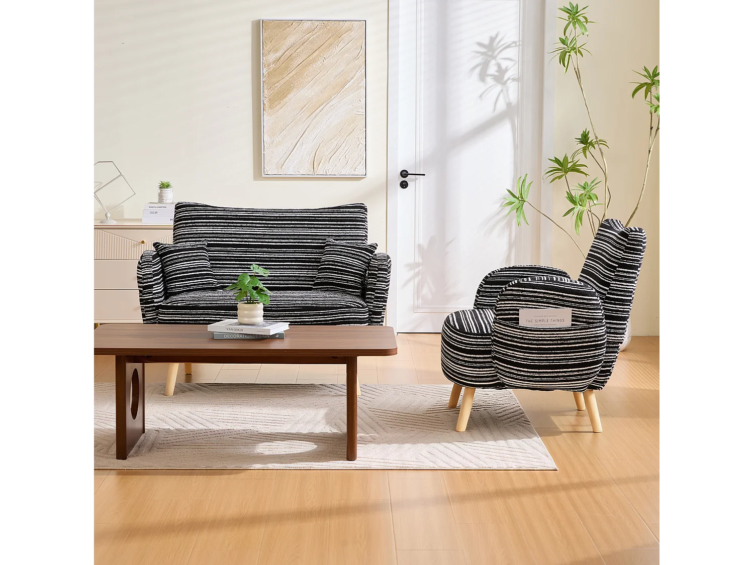 Canapé 2 places bouclé noir, assise profonde, accoudoirs rembourrés, sac de rangement, petit espace