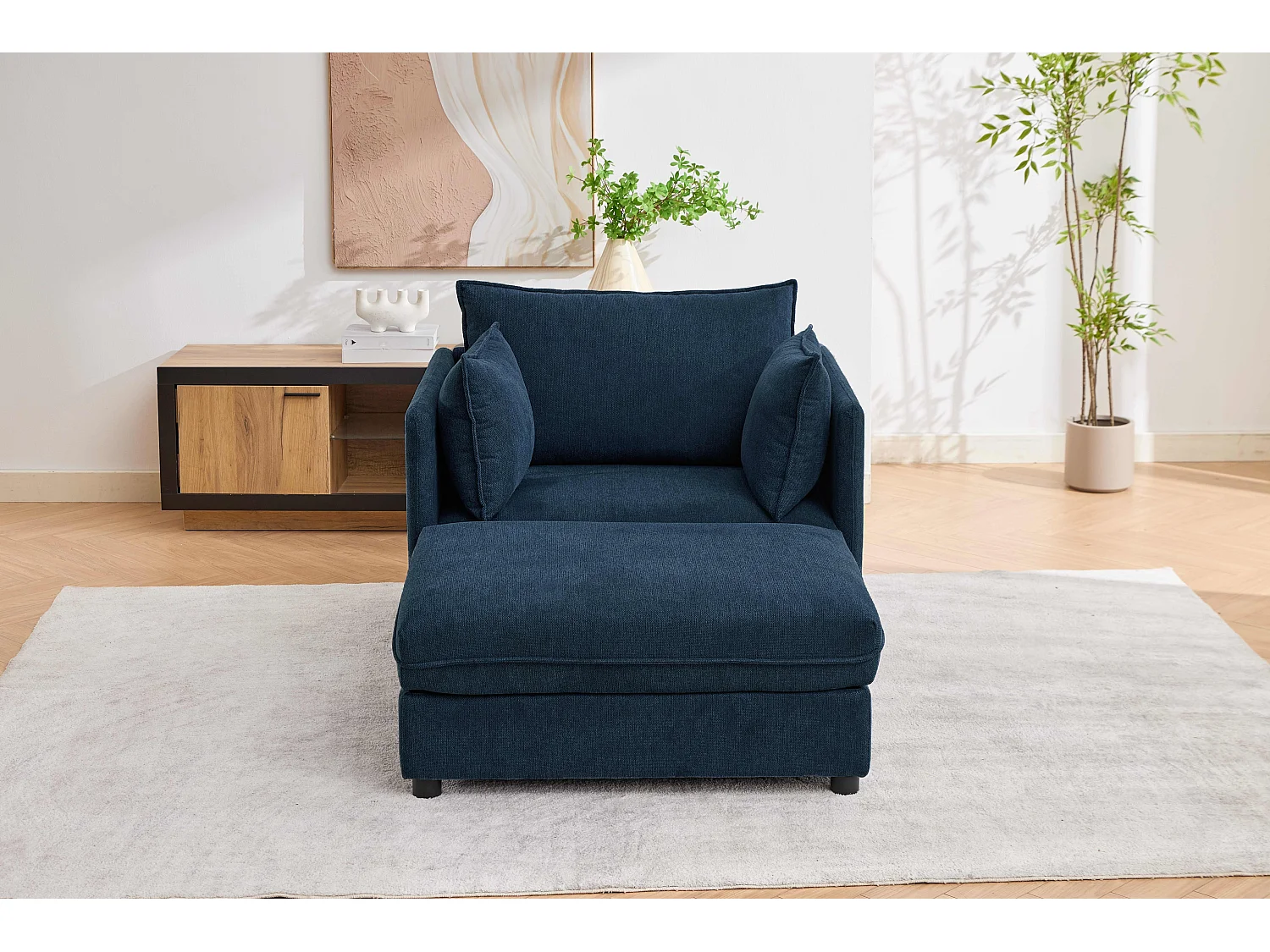 Fauteuil relax bleu foncé en chenille, avec repose-pieds et rangement intégré, design scandinave