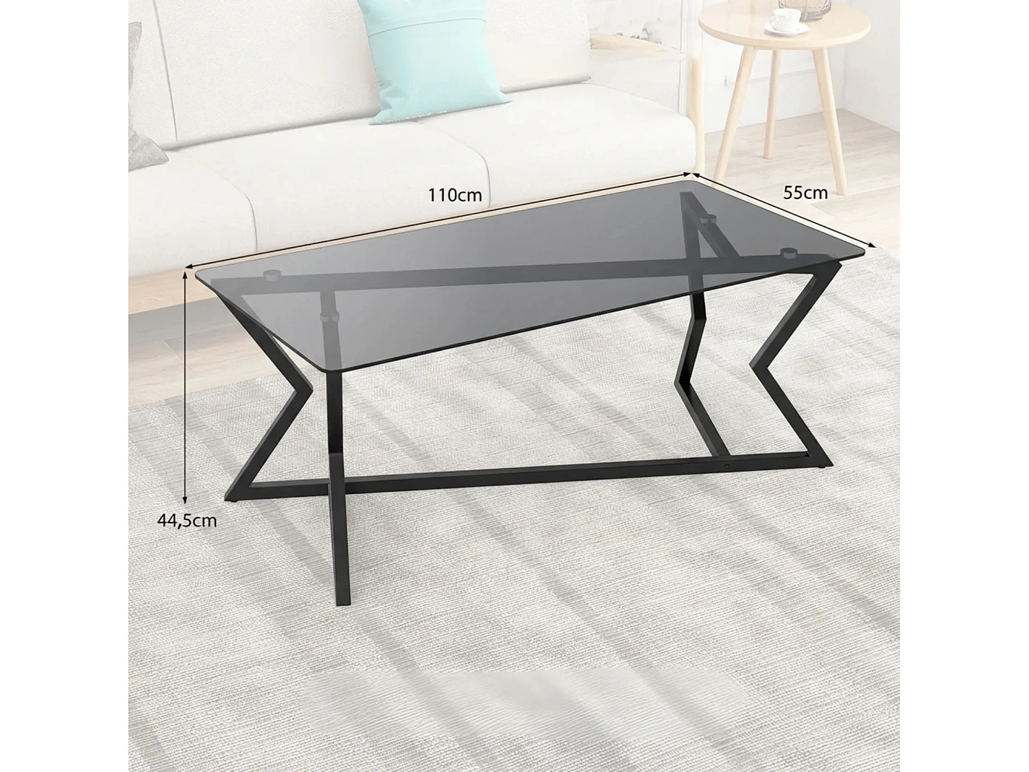 Soffbord med bordsskiva av härdat glas och geometrisk ram
