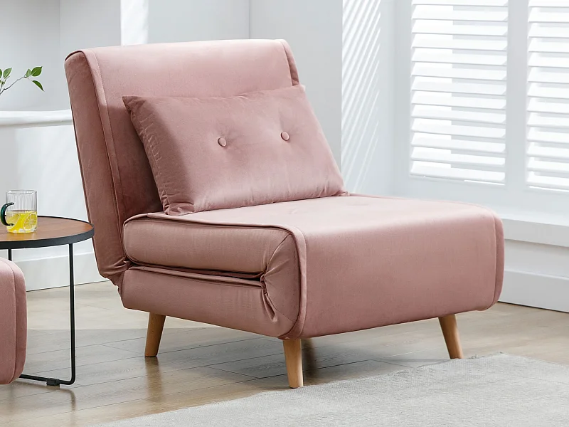 Vadderad vändbar fåtölj i pudderrosa sammet URIBIA
