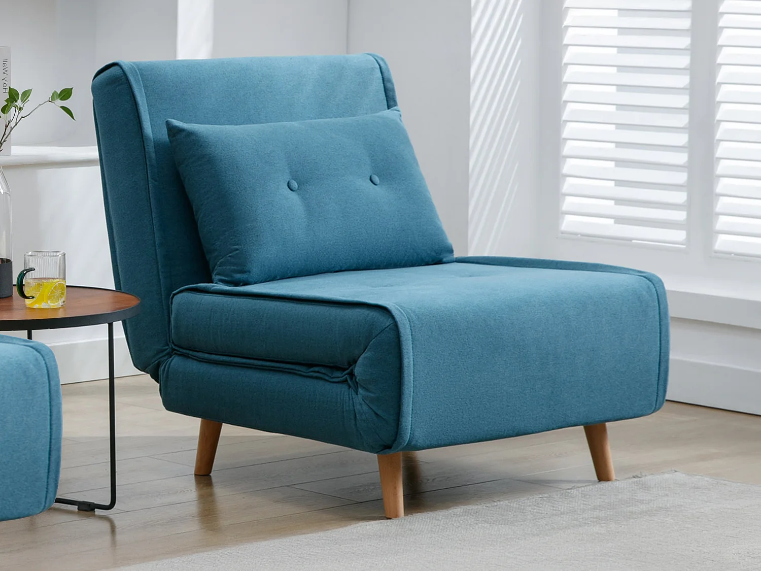 Sillón cama de tela azul URIBIA