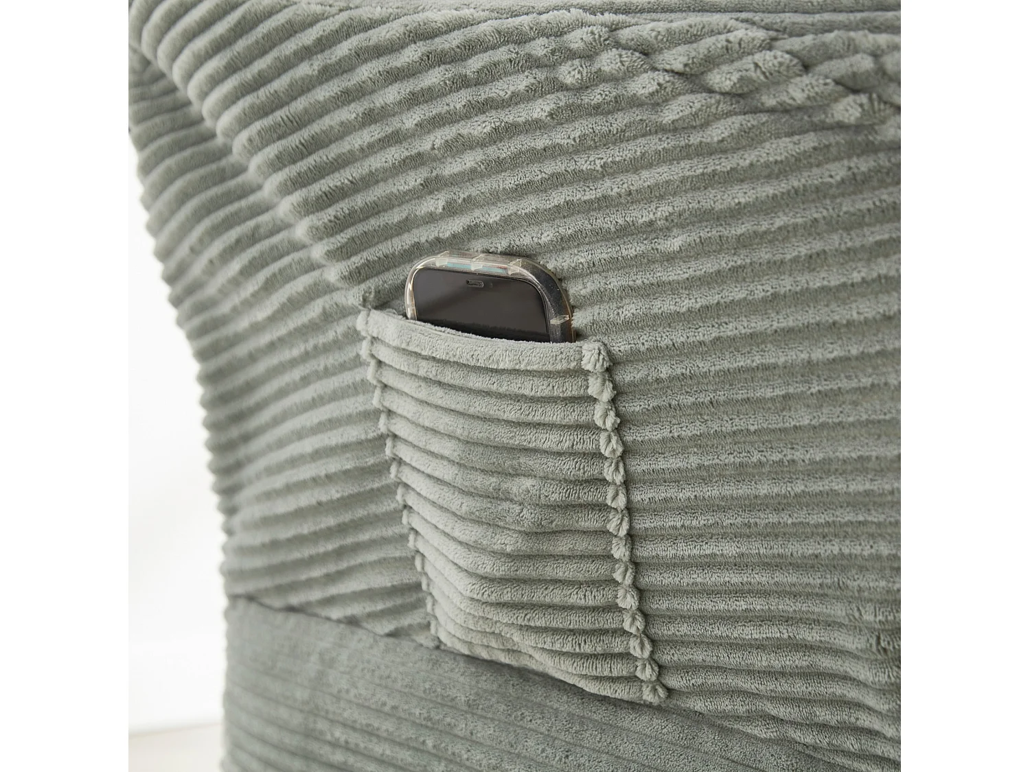 Fauteuil lounge en flanelle avec repose pieds, poche latérale et structure acier noire