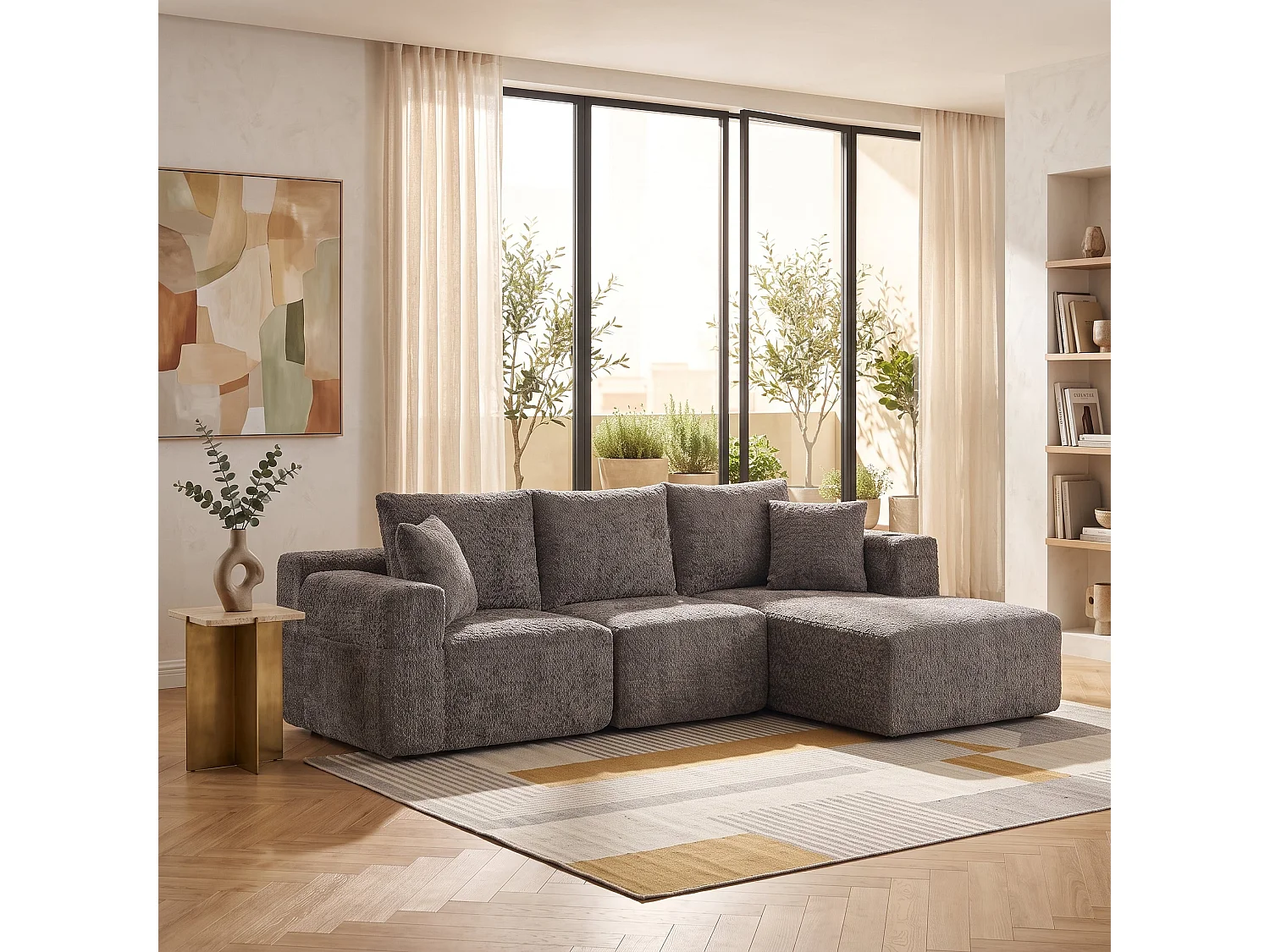 Canapé d’angle 3 places en chenille gris bouclette texturée accoudoirs