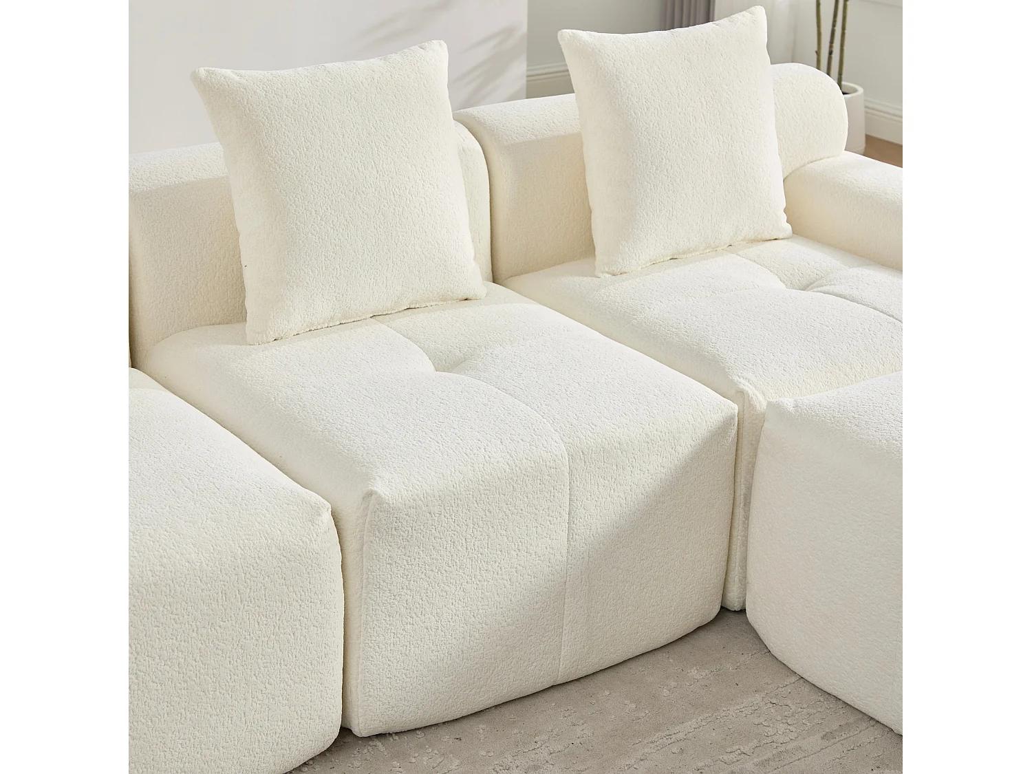 Canapé modulable 3 places en chenille beige bouclette texturée
