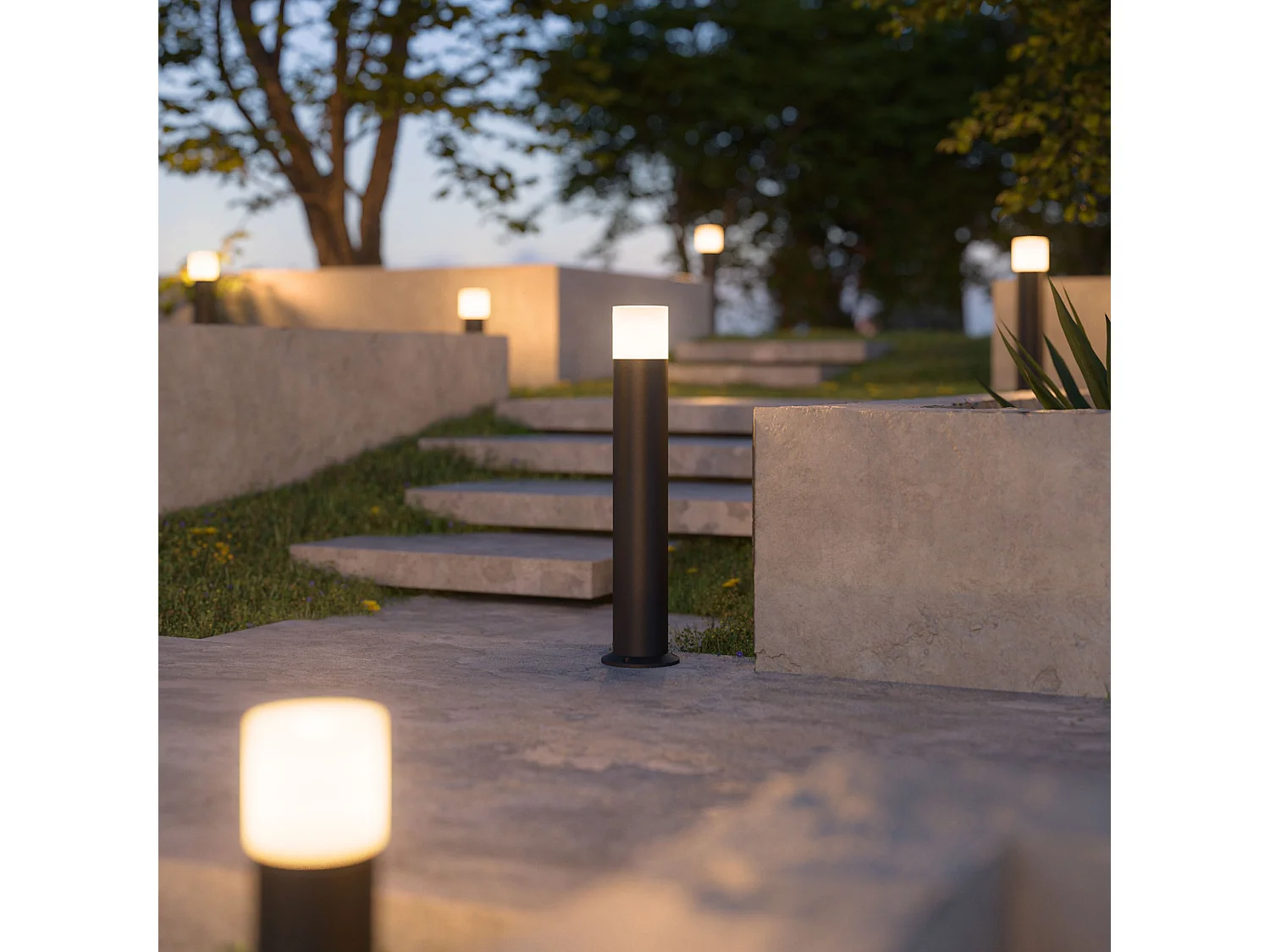 Tura 12W 3000K Outdoor Cylindrical LED Floodlight 180 Degree Beam IP65 IK06 Matt Black Finish Height 60cm Pathway Lighting