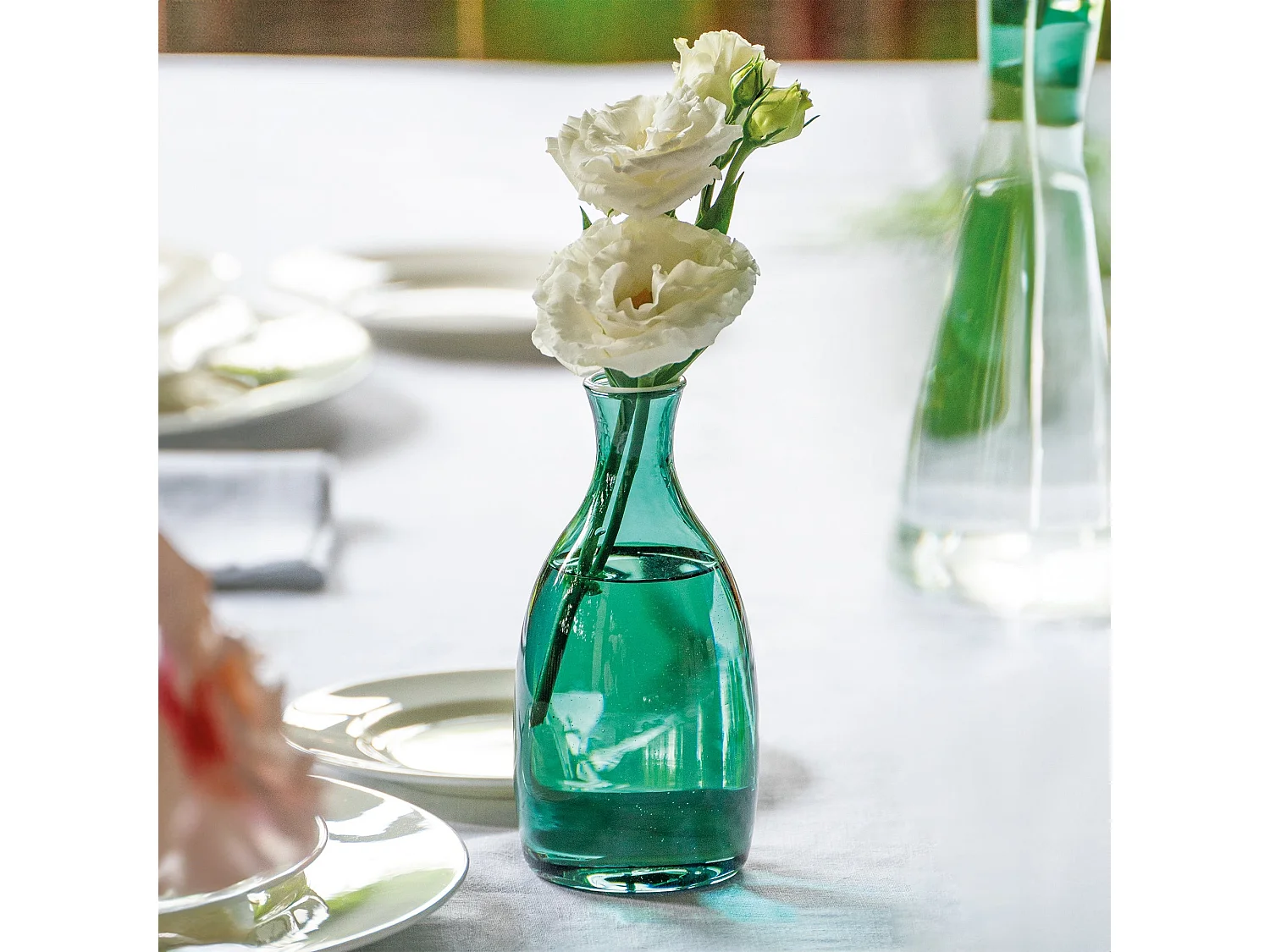 Un Fiore syltetøjskrukke, 35 cl, mundblæst borosilikatglas, hvid kant, havgrøn farve, elegant design til stilfuld indretning.