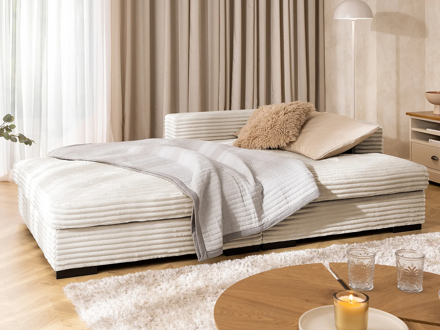 Canapé d’angle avec assise profonde, fonction couchage et pratique coffre de rangement, en tissu côtelé doux WOLKE