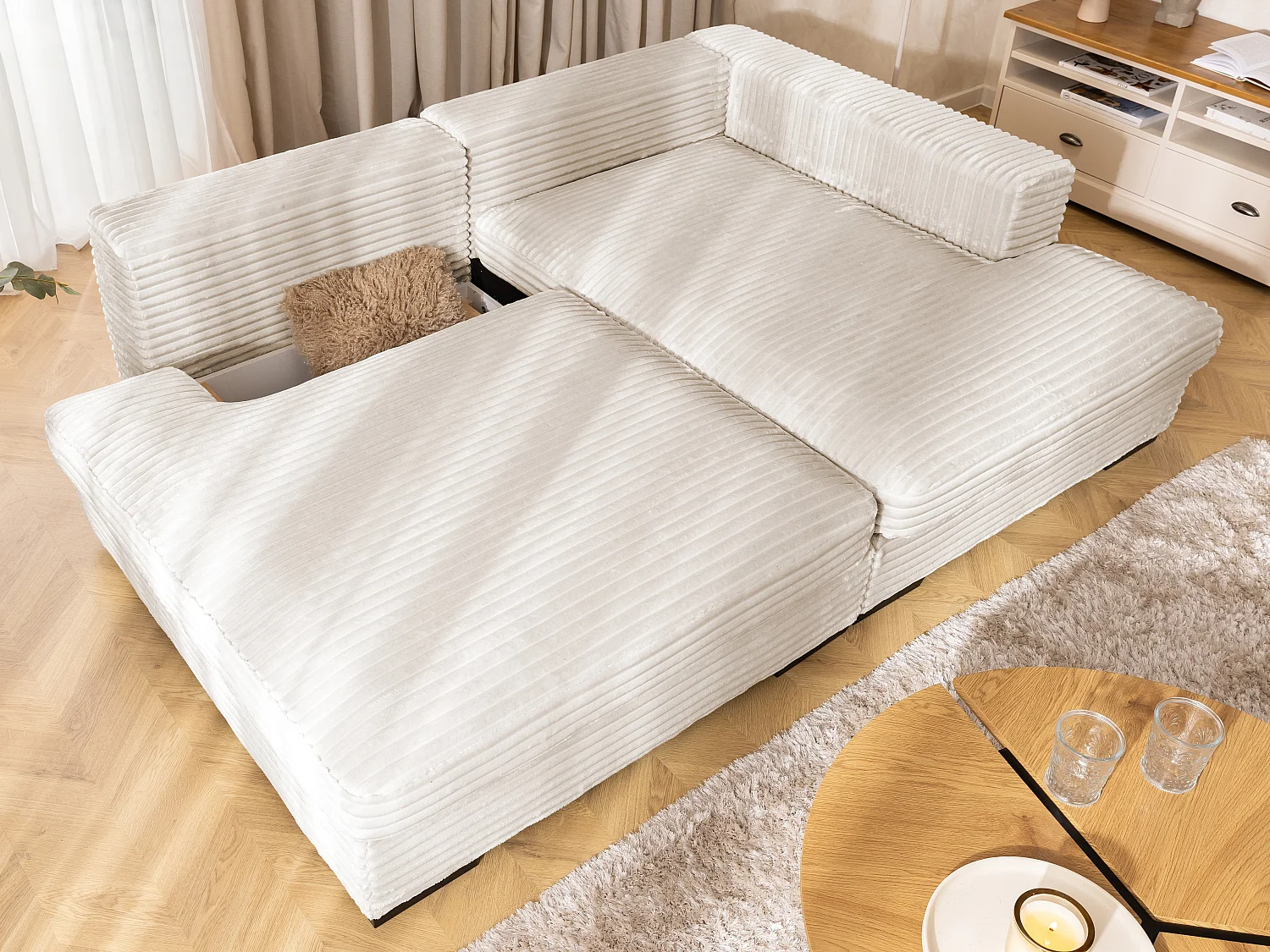 Canapé d’angle avec assise profonde, fonction couchage et pratique coffre de rangement, en tissu côtelé doux WOLKE