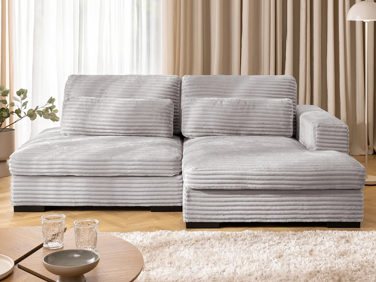 Canapé d’angle avec assise profonde, fonction couchage et pratique coffre de rangement, en tissu côtelé doux WOLKE