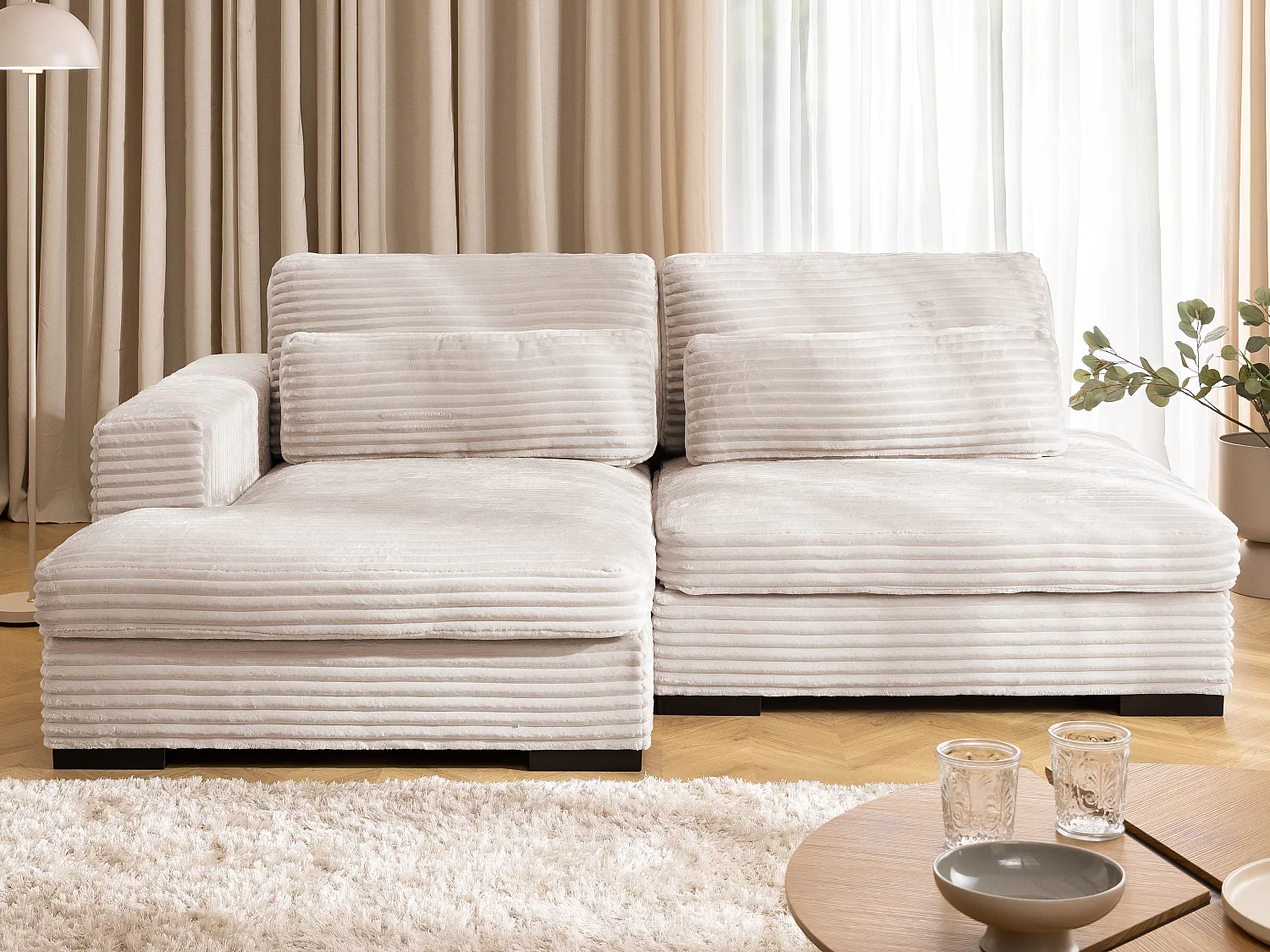 Canapé d’angle avec assise profonde, fonction couchage et pratique coffre de rangement, en tissu côtelé doux WOLKE