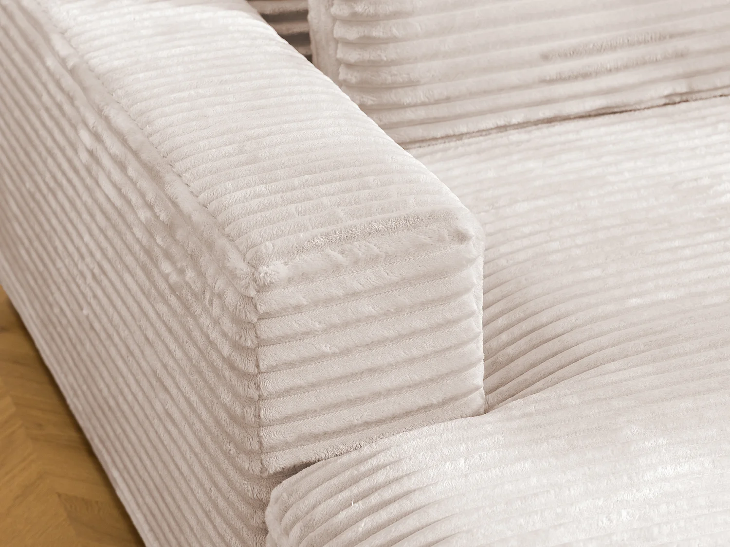 Canapé d’angle avec assise profonde, fonction couchage et pratique coffre de rangement, en tissu côtelé doux WOLKE
