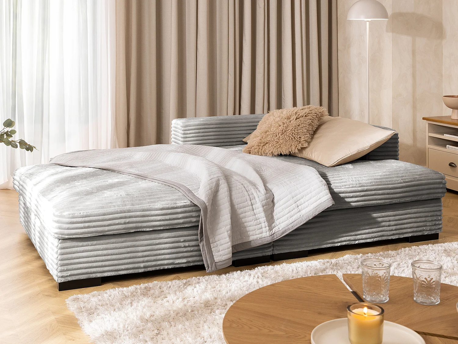 Canapé d’angle avec assise profonde, fonction couchage et pratique coffre de rangement, en tissu côtelé doux WOLKE
