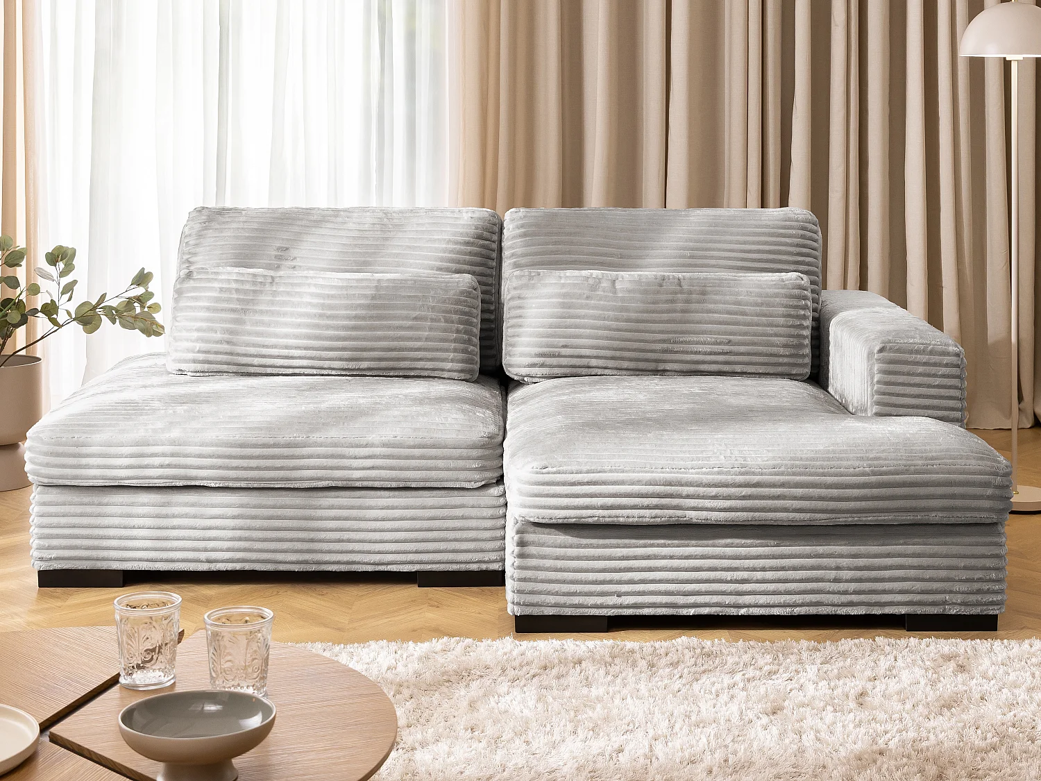Canapé d’angle avec assise profonde, fonction couchage et pratique coffre de rangement, en tissu côtelé doux WOLKE