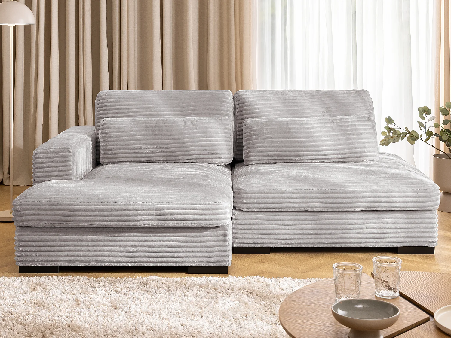 Canapé d’angle avec assise profonde, fonction couchage et pratique coffre de rangement, en tissu côtelé doux WOLKE