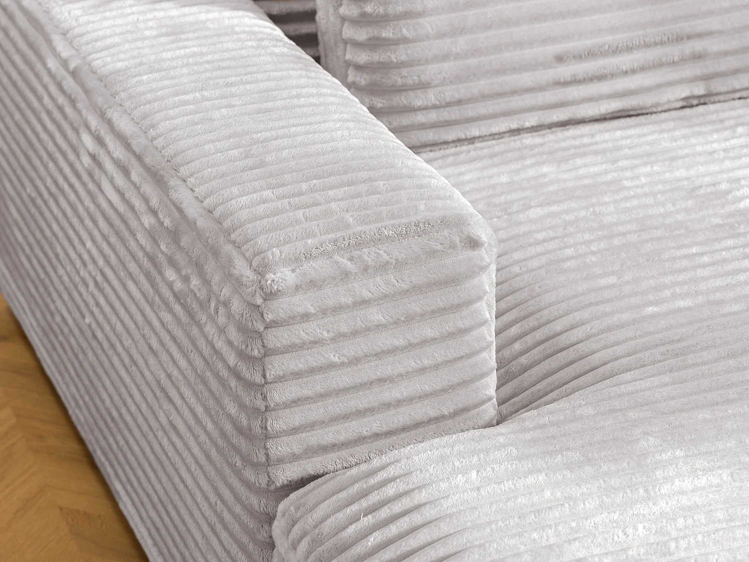 Canapé d’angle avec assise profonde, fonction couchage et pratique coffre de rangement, en tissu côtelé doux WOLKE