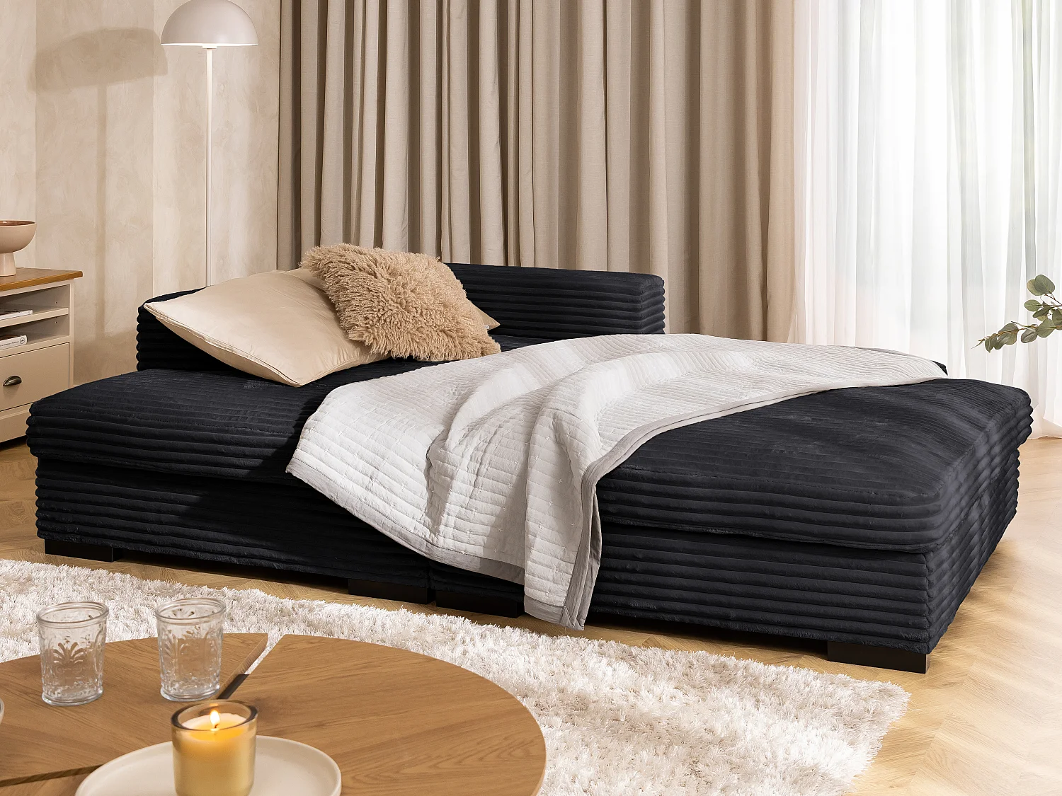 Canapé d’angle avec assise profonde, fonction couchage et pratique coffre de rangement, en tissu côtelé doux WOLKE