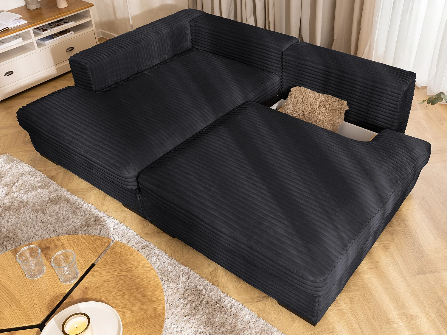 Canapé d’angle avec assise profonde, fonction couchage et pratique coffre de rangement, en tissu côtelé doux WOLKE