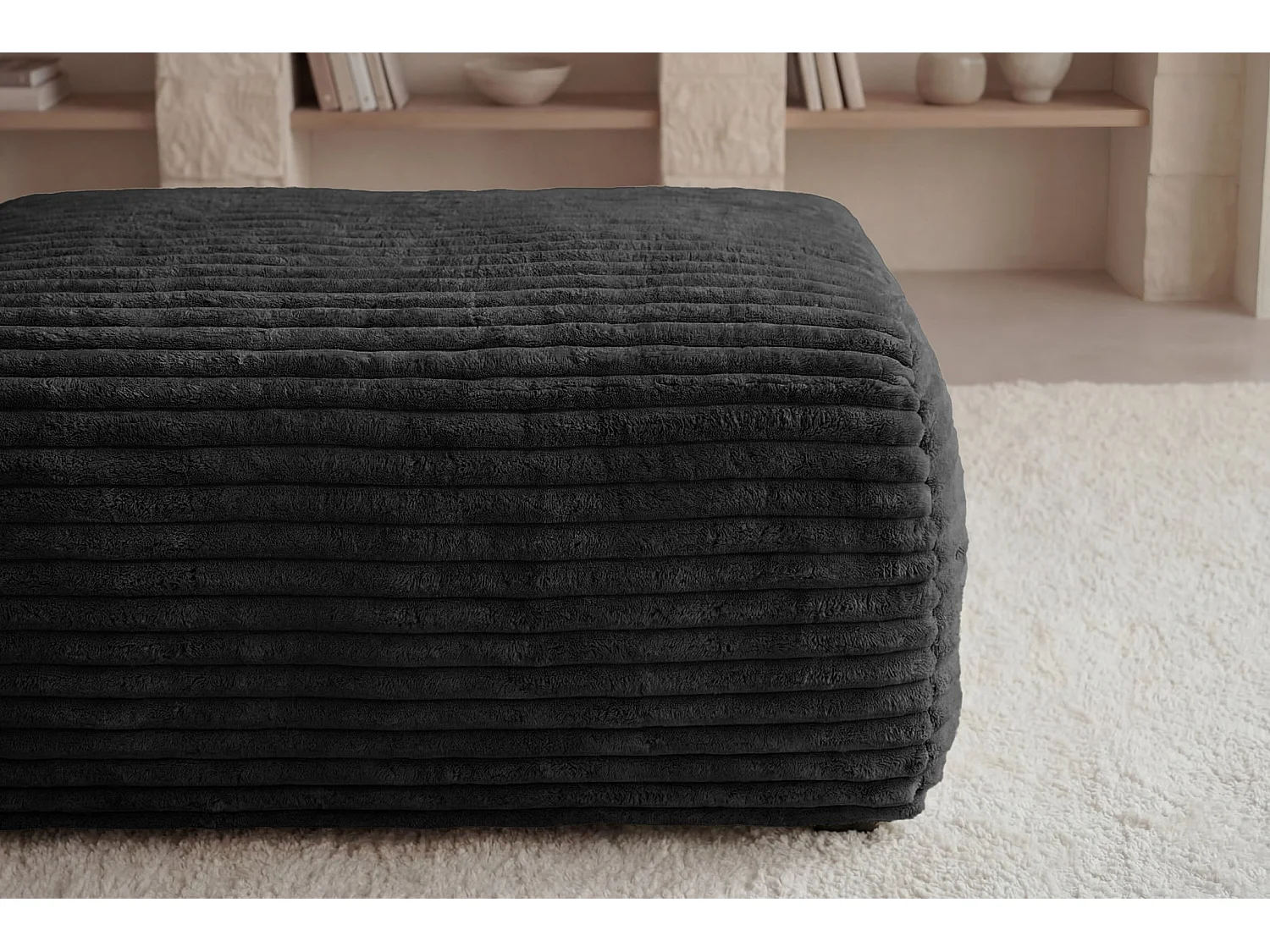 OLYMPE - Zwarte ribfluwelen poef 100x68x42 cm
